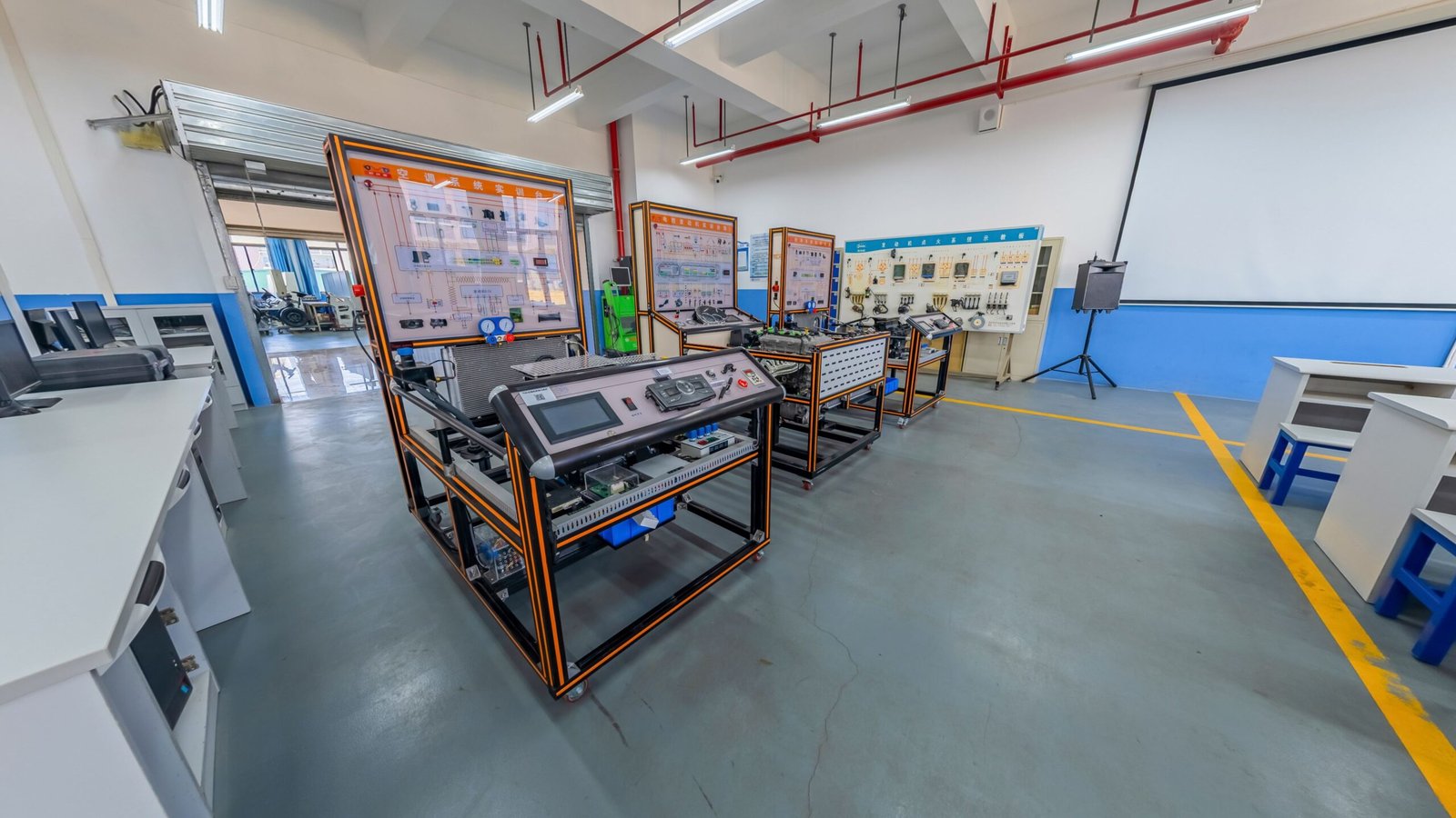 Students learning electronic measurement in a laboratory