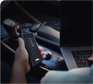 Engineer using Kvaser vehicle communication equipment